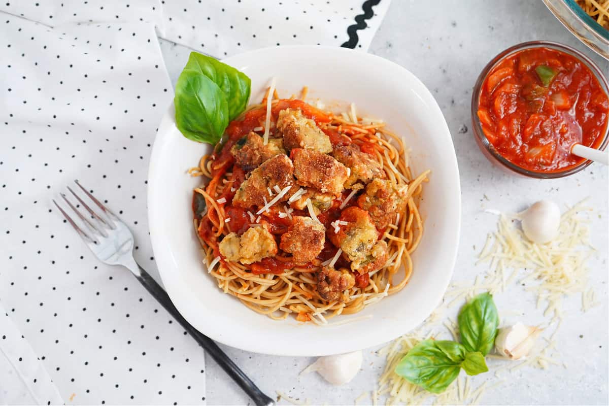 Tasty Air Fried Eggplant Pasta with Zesty Marinara sauce and parmesan cheese.