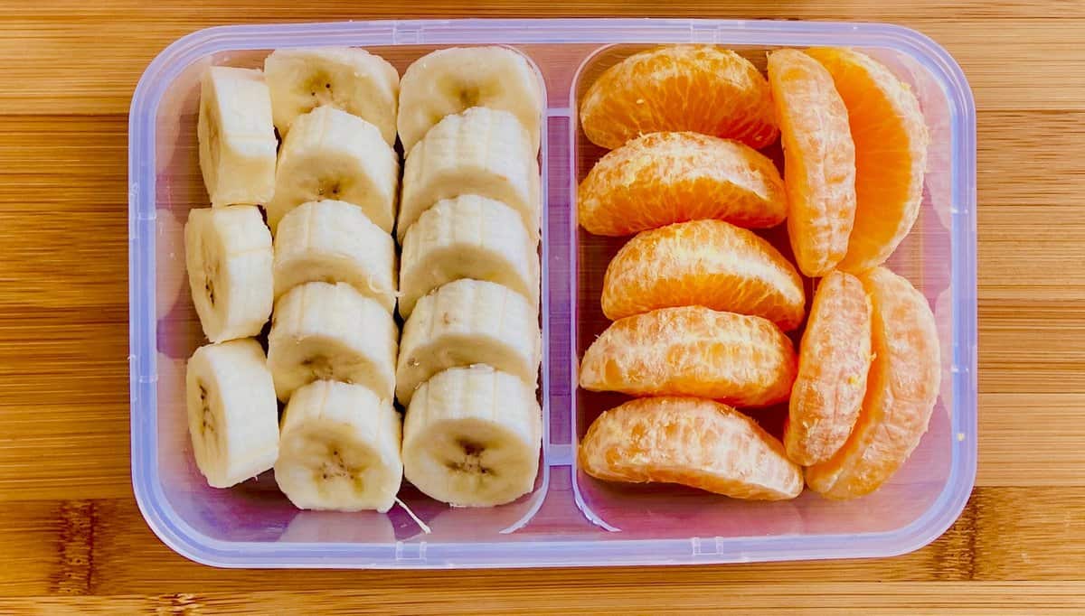 Orange, Mango and Banana Smoothie Popsicles - Fruit in Plastic Container