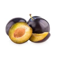 cut plums on white background