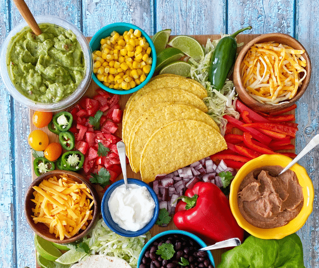 Mexican food ingredients on a Taco Board.